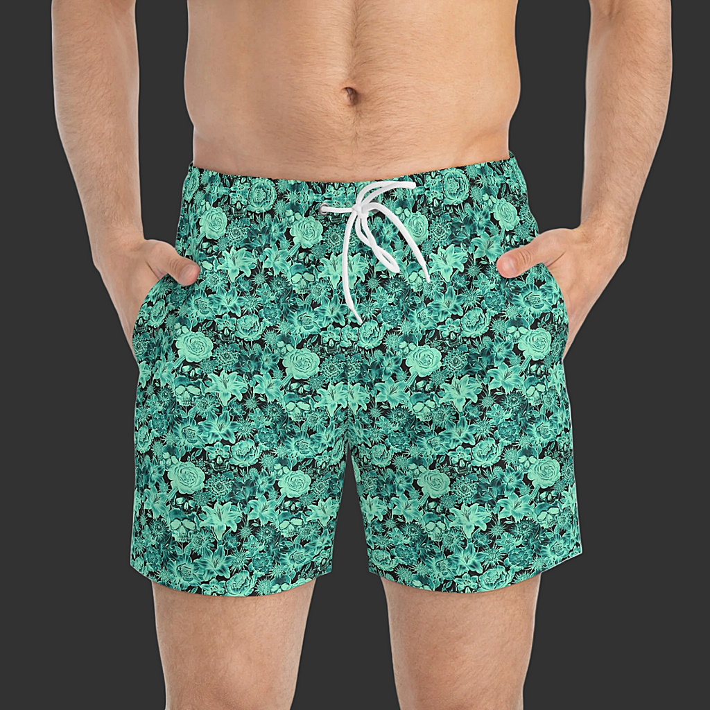 Skull & Floral Swim Trunks — 'Non Curo' Teal on Black All-Over Print